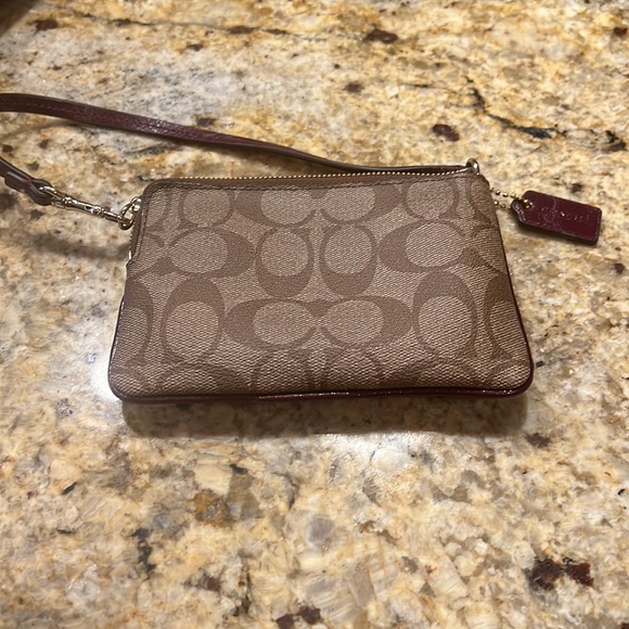 Coach wristlet wallet. Dark brown maroon leather and Coach logo design. - Picture 4 of 5